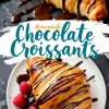 A single chocolate croissant on a white plate, drizzled with melted chocolate and garnished with fresh raspberries. A bold text overlay reads “Homemade Chocolate Croissants” on a white background.