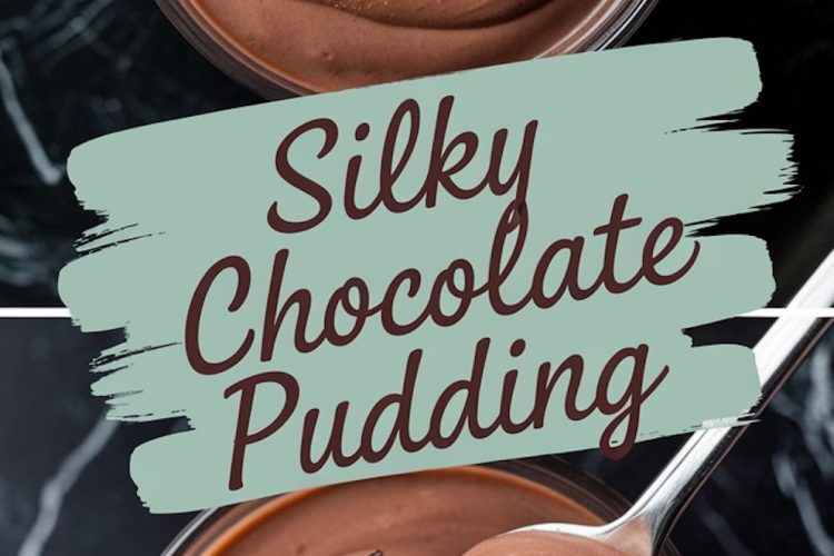 A close-up of chocolate pudding in a bowl, topped with a sprinkle of cocoa powder and a piece of dark chocolate, with a spoon scooping the creamy dessert to showcase its glossy finish.