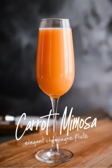 A single champagne flute filled with bright orange carrot mimosa placed on a wooden surface with a dark, blurred background. The stylish typography below the glass reads “Carrot Mimosa” and “elegant champagne flute,” enhancing the sophisticated presentation.