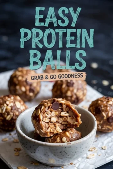 Small ceramic bowl holding oatmeal chocolate chip protein balls with one ball cut open to show the textured interior, captioned with “Easy Protein Balls Grab & Go Goodness.”