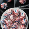 Swirled red, white, and blue meringue cookies displayed on a white plate with close-up shots on a black marble background. These patriotic treats feature vibrant spiral patterns and glossy peaks, ideal for festive dessert tables and 4th of July party ideas.