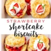 Flat lay of four golden strawberry shortcake biscuits in a white baking dish, each layered with macerated strawberries and topped with whipped cream and halved strawberries.