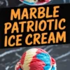 Red, white, and blue marble ice cream scoops served in a white ramekin on black marble, with bold text reading “Marble Patriotic Ice Cream” across the center, perfect for Fourth of July or summer dessert ideas.