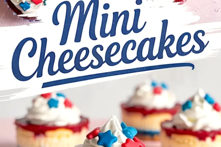 Mini cheesecakes with red fruit topping, creamy white filling, and blue crusts, garnished with piped whipped cream and red, white, and blue star sprinkles.