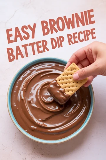 Hand dipping a rectangular graham cracker into a bowl of rich, glossy brownie batter dip with text overlay that reads “Easy Brownie Batter Dip Recipe.”