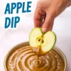 Hand dipping a halved green apple into a bowl of smooth caramel sauce, labeled “Caramel Apple Dip” in bold blue text.