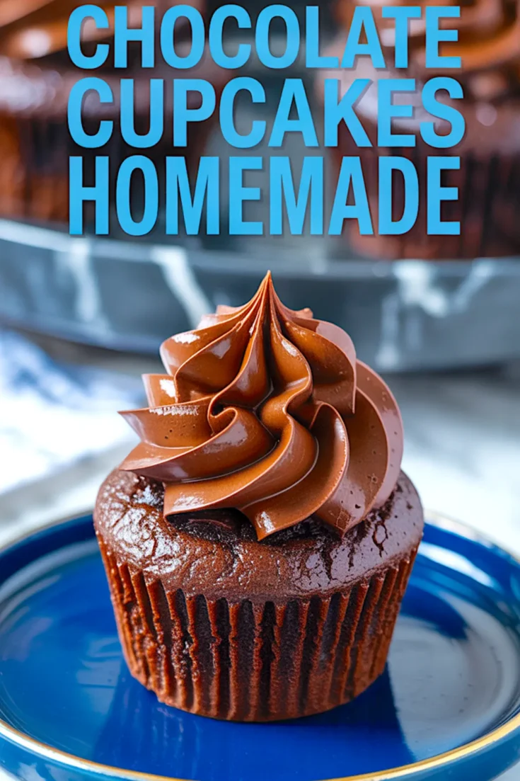 Single homemade chocolate cupcake with glossy chocolate frosting, placed on a blue plate with a bold text overlay that reads “Chocolate Cupcakes Homemade.”