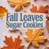 Autumn maple leaf cookies in red, yellow, and orange icing with “Fall Leaves Sugar Cookies” text centered, surrounded by dried leaves on a pastel backdrop.