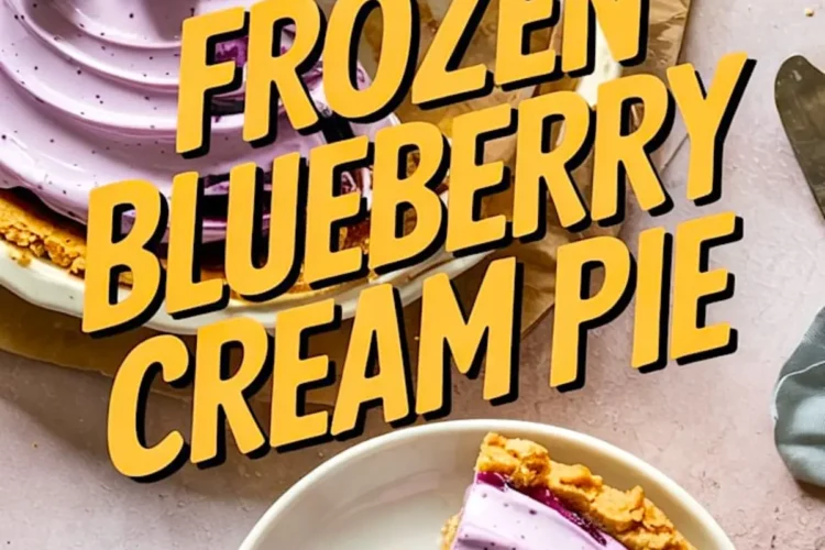 Overhead view of a sliced frozen blueberry cream pie with smooth purple filling, topped with whole blueberries, and one slice served on a white plate with crumbs scattered.