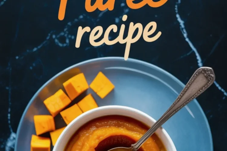 Overhead view of a bowl of pumpkin purée with a spoon, placed on a blue plate with diced pumpkin cubes, with text reading “Pumpkin Purée Recipe.”