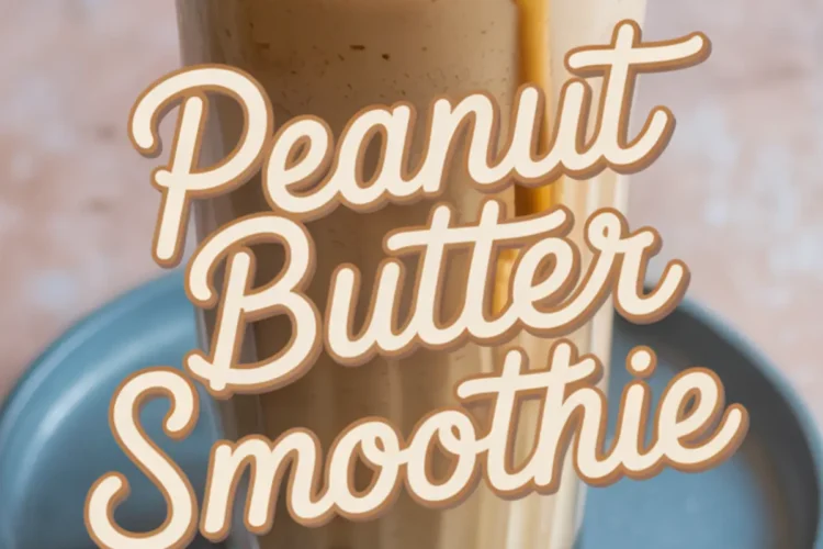Tall glass of peanut butter smoothie topped with chopped peanuts and peanut butter drizzle, with bold text overlay reading “Peanut Butter Smoothie.”