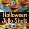 Collage displaying striped Halloween Jello shots in vivid layers of green, purple, and orange, each topped with a blue candy eyeball and colorful gummy worm, with bold text reading “Halloween Jello Shots.”