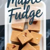 Close-up view of maple fudge squares in a serving tray, garnished with pecans and sea salt flakes, with a “Maple Fudge” text overlay.