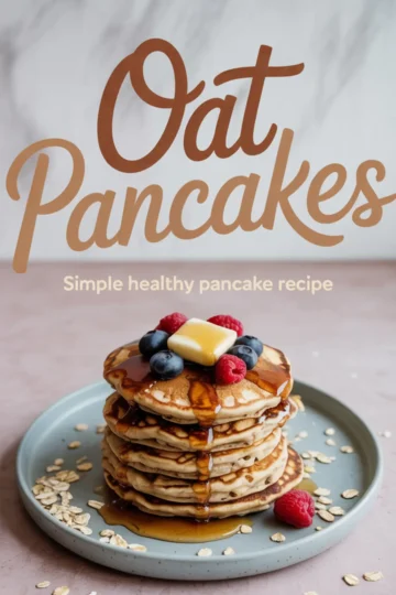 Stack of golden oat pancakes topped with fresh blueberries, raspberries, a square of butter, and a generous drizzle of maple syrup, with “Oat Pancakes - Simple healthy pancake recipe” in bold script above.