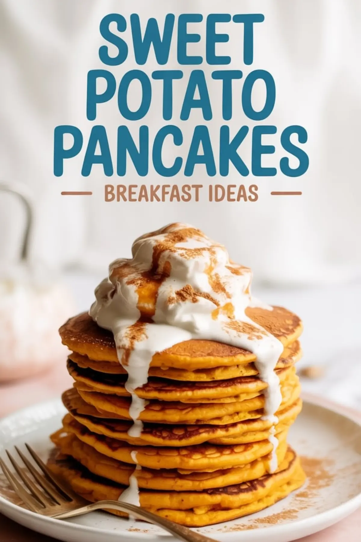Stack of sweet potato pancakes topped with whipped cream, cinnamon, and maple syrup on a white plate, with a fork resting beside, promoting breakfast ideas.