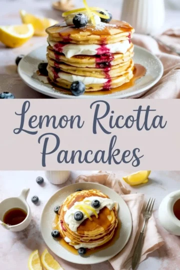 Fluffy lemon ricotta pancakes stacked with layers of cream and blueberry sauce, topped with lemon zest, whipped topping, and maple syrup, surrounded by blueberries, lemon slices, and pastel-toned tableware on a marble background.