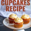 A vertical collage of three pumpkin cupcakes topped with vanilla frosting on a white cake stand, placed on a dark marble surface with “Fall Cupcakes Recipe” text overlay in bold orange letters.