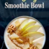 Overhead shot of a pear ginger smoothie bowl garnished with sliced pear, cinnamon, pineapple chunks, and whole walnuts on a black marbled background, with a title text overlay.