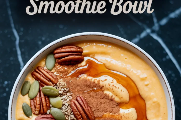 Spiced sweet potato smoothie bowl topped with pecans, pumpkin seeds, flax seeds, cinnamon, and a drizzle of maple syrup, placed on a dark marble surface with text overlay.